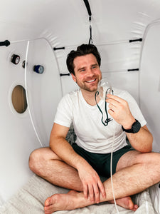 Man in OneBase's mild Health Hyperbaric Chamber HBOT